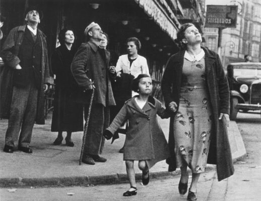 Robert Capa, [Woman and child running for shelter after an air-raid siren, Bilbao], May 1937.